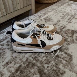 Stylish White and Tan Sneakers
